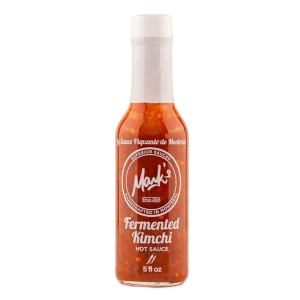 A bottle of Mark's Fermented Kimchi Hot Sauce as seen on Hot Ones