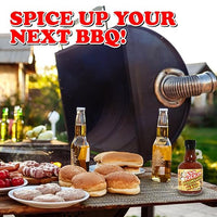 Ass Kickin' Moonshine Pepper Mash on a table alongside burger buns, meat patties, tomatoes, and a couple of bottles of beer. A smoker grill is in the background.